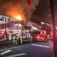 <p>Bethel and Stony Hill firefighters, with the help of many mutual aid companies, respond to a fire on Greenwood Avenue in downtown Bethel just after 1 a.m. Thursday</p>