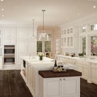 <p>The interior includes marble countertops, modern appliances and more.</p>