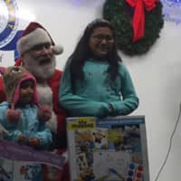 <p>Port Chester held its annual holiday tree lighting Thursday night, which featured an appearance from Santa.</p>