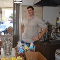 <p>Brody Litton shows off a chocolate bunny and mold at Meyer&#x27;s House of Sweets in Wyckoff.</p>