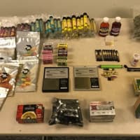<p>Police in Tarrytown recovered weapons and drugs at the scene.</p>