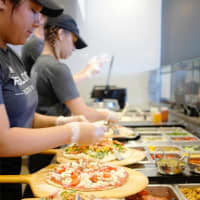 <p>Lots of toppings at Pieology.</p>