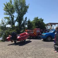 <p>Crews from the Croton-on-Hudson Fire Department aiding a sailboat that got stuck on a sandbar in the south end of Croton Point.</p>