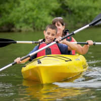 <p>Youngsters take part in an earlier Lake Tappan Paddle Day.</p>