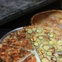 <p>An assortment of toppings available.</p>