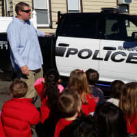 <p>Rutherford Detective Sgt. Thomas Lewis talks to students.</p>