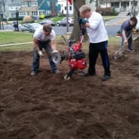 <p>A crew digs a hole in front of Grace Episcopal Church for Nowoslawski&#x27;s labyrinth.</p>