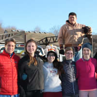 <p>Wooster School students deliver the 129 turkeys donated for Thanksgiving meals. </p>