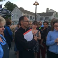 <p>The Rev. Skip Karcsinski speaks at a Westport vigil for the victims of the Orlando nightclub shootings.</p>