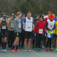 <p>Runners line up at the starting line at Brookfield High School for Friday&#x27;s race.</p>