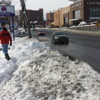 <p>It was rough going on Monday for pedestrians along Route 1 in Port Chester, where some stretches of sidewalk were shoveled but others were not. This walker trudges through snow near Pearl Street. A stretch near Kohl&#x27;s Shopping Center also was bad.</p>