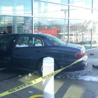 <p>A car drives into the lobby of Greenburgh Public Library at 300 Tarrytown Road early Friday afternoon. No one was reported hurt.</p>