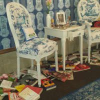 <p>A sitting room that features books and history about women at the ArtsWestchester exhibit at 31 Mamaroneck Ave. in White Plains.</p>