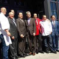 <p>White Plains Mayor Tom Roach, center, and Westchester County Chief of Staff George Oros joined owners and chefs at KEE Oyster House for a ribbon-cutting ceremony on Tuesday.</p>