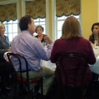<p>Rye Police Commissioner Michael C. Corcoran Jr., far left, joined members of Rye Rotary Club as guest speaker during a meeting Thursday. Rotary President Pamela Dwyer, left, and President-elect Jason L. Mehler are seated on either side of Corcoran.</p>