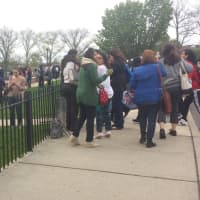 <p>Students and staff await the &quot;all clear&quot; signal Friday morning outside Port Chester High School, which was evacuated before 8 a.m. due to a suspected carbon monoxide leak.</p>