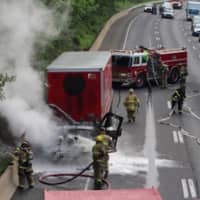 <p>View of the fire scene from the Parmalee Hill Road bridge shows the traffic backup on I-84 in Newtown.</p>