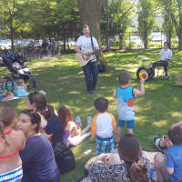 <p>Families attended a Songs for Seeds concert at the Scarsdale Pool.</p>