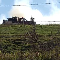 <p>Smoke from a fire at Willowbrook Farm in North East.</p>