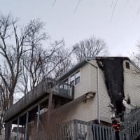 <p>A fire ripped through this home at 44 Fleetwood Drive in Danbury early Sunday.</p>