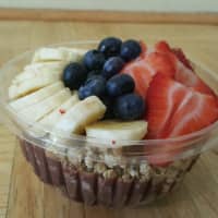 <p>Sayegh made this acai bowl at home. It&#x27;s topped with granola, blueberries, strawberries and banana slices.</p>