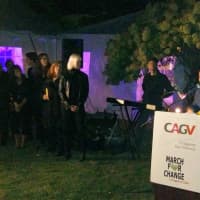 <p>About 100 people gathered at a candlelight vigil for the victims of the Las Vegas massacre.</p>