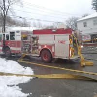 <p>Danbury firefighters only had to cross the street to douse a restaurant fire.</p>