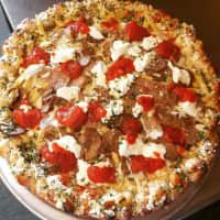 <p>Pizza Mia prides itself on its gourmet artisanal pies.</p>