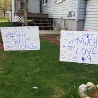 <p>Auburn Little League players and coaches left signs full of words of encouragement at the St. Francis&#x27; Auburn home to welcome Cameron back from the hospital on April 16.</p>