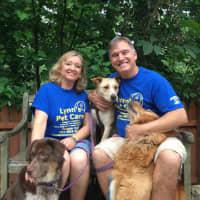 <p>Mike and Angela Lynn of Midland Park with their three dogs.</p>