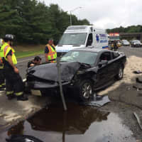<p>Nichols Fire Department crews respond to a two-car crash on the northbound Merritt on Saturday.</p>