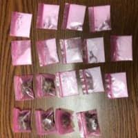 <p>The plastic bag discarded by the suspected contained individual baggies containing marijuana and cocaine, Stamford police said.</p>