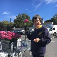 <p>A cart full of roses ready to be handed out and bring good cheer to Wilton Center.</p>