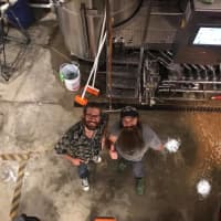 <p>David Krantz (left) and Sean Donnelly on the floor of Fox n Hare in Port Jervis.</p>