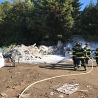 <p>The Long Hill Fire Department responds to a fire Wednesday at the transfer station in Trumbull.</p>
