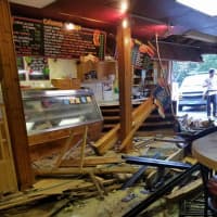 <p>A car smashed into Martino&#x27;s Pizzeria and Deli in Danbury, causing extensive damage to the building&#x27;s interior.</p>