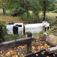 <p>A garbage truck flipped and landed on its side in Croton Point Park.</p>