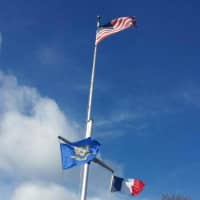 <p>The French flag is flying at the Governor&#x27;s Residence in Hartford on Saturday with the Connecticut flag and the U.S. flag.</p>