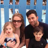 <p>Samantha and Joel Colindrés and their two children.</p>