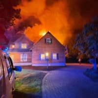 <p>Fire crews were quick to douse a roaring blaze that broke out in the attached garage of a Sussex County home before dawn Wednesday.</p>