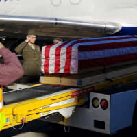 <p>The remains of Marine Cpl. Walter Critchley, of New Rochelle, were brought to Arlington National Cemetary, where he was buried with full military honors.</p>