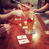<p>Cards, beer and football are on tap at Redding Beer Company in Redding.</p>