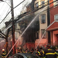 <p>More than 80 firefighters battled a four-alarm fire in Yonkers.</p>