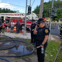 <p>Deputy Sheriffs on the scene after the fire was extinguished.</p>