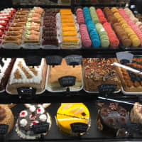 <p>The bakery offers an assortment of cakes, pies and macaroons.</p>