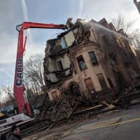 <p>Crews took down a zombie home on Warburton Avenue in Yonkers.</p>
