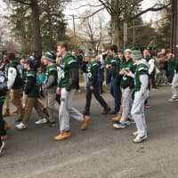 <p>The Pleasantville Panthers football team parade through town</p>