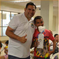 <p>Alejando Delgado (left) started Smiles Without Limitations to help people with disabilities in Latin America receive oral care.</p>