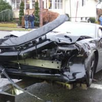 <p>A Chevrolet Camaro was hit after a Nissan Altima ran a stop sign, hitting the sports car and then a house Saturday.</p>