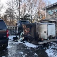 <p>A pesticide truck was destroyed by fire on Wednesday afternoon in Trumbull. Firefighters kept the flames from spreading to a nearby home and garage.</p>